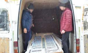 Ţigări de contrabandă ascunse în interiorul unor uşi de pal, confiscate la frontieră