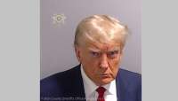 Trump s-a prezentat la o închisoare din Atlanta pentru a fi amprentat şi fotografiat ca inculpat